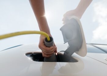 Home EV Charging in the UK Wall-Mounted Charger Connected to Electric Car Medium