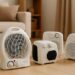 Top 5 thermo fan heaters under £15 placed in a cozy living room setting for efficient home heating.