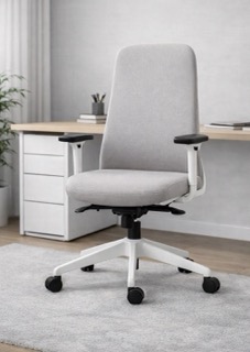 Boulies NUBI ergonomic office chair with light‑gray upholstery, white frame, and black adjustable armrests, positioned in front of a light wood desk in a bright, minimalist home office with soft natural lighting.