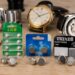 LiCB, Renata and Maxell SR621SW 364 silver oxide watch batteries arranged with watches on a wooden table.